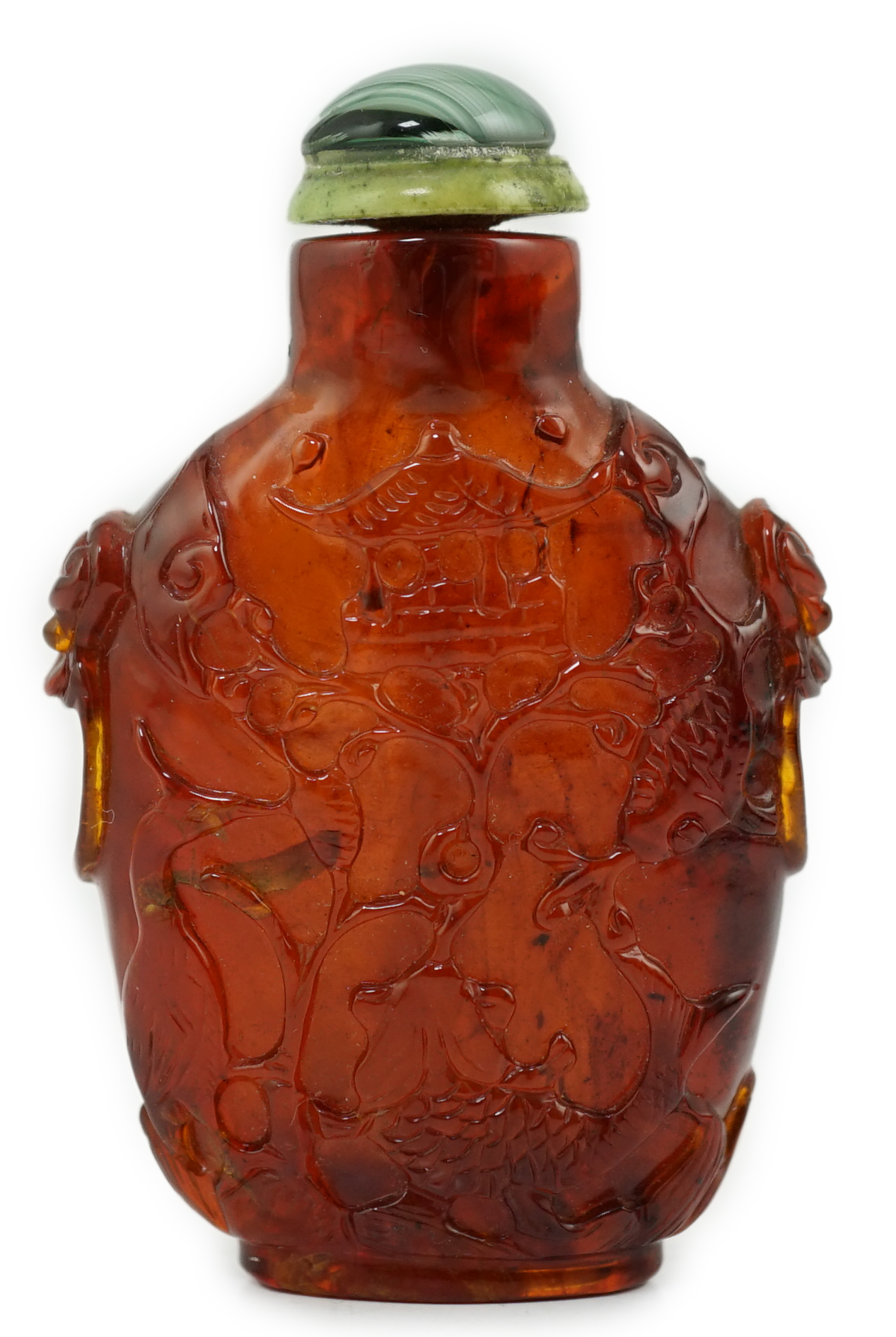 A Chinese carved amber snuff bottle, 19th century